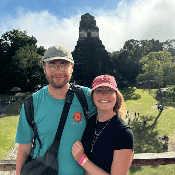 Cat in front of Tikal's ancient Mayan ruins