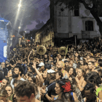 Crowd with large trumpets