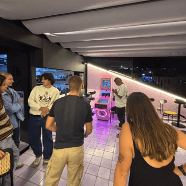 Travel friends playing a traditional Colombian pin ball game